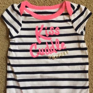 Newborn girl’s onesie